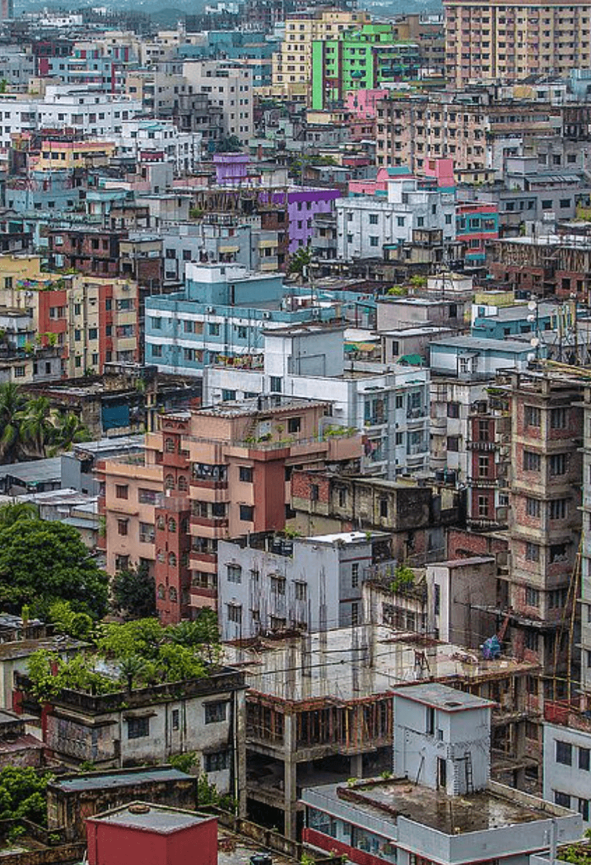 Dense Dhaka skyline with thousands of unused flat rooftops